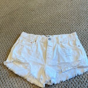 White denim ripped jean shorts
